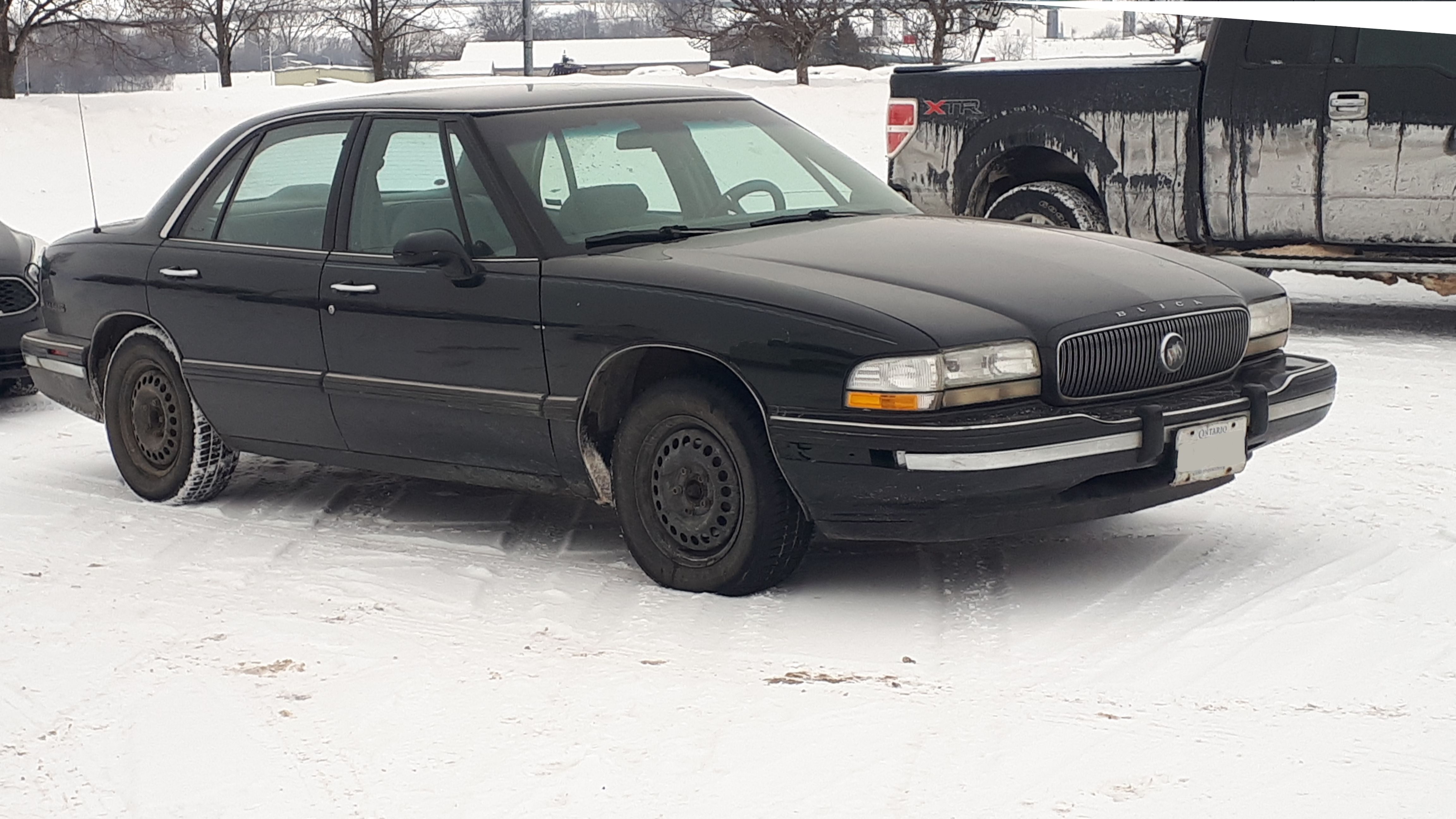 A Buick LeSabre in black.