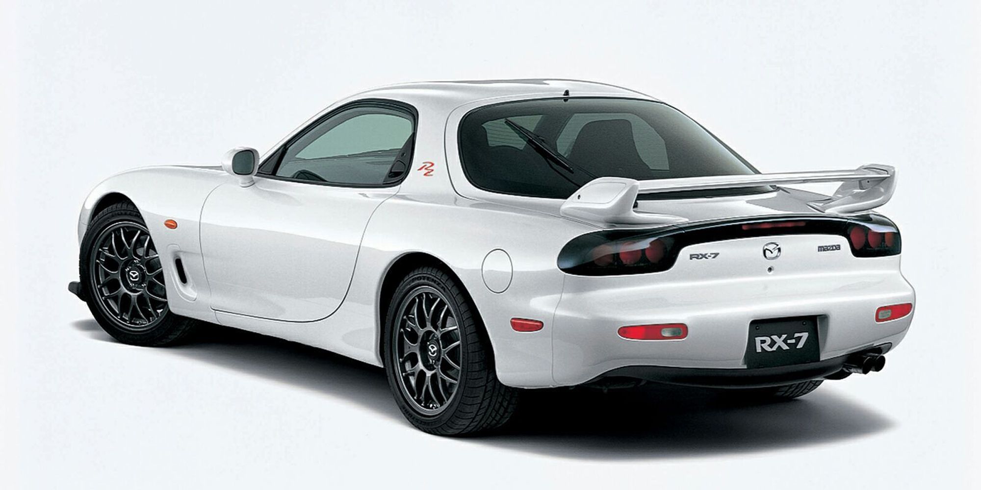The rear of a white FD RX-7 RZ