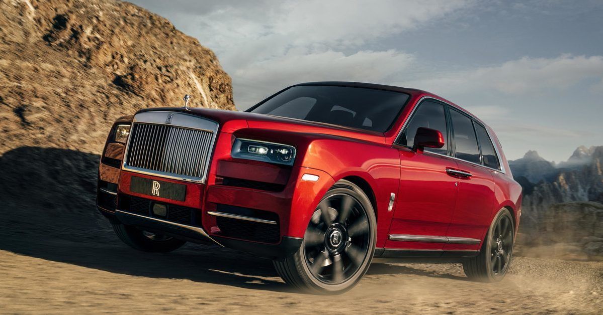 A red Cullinan off-roading