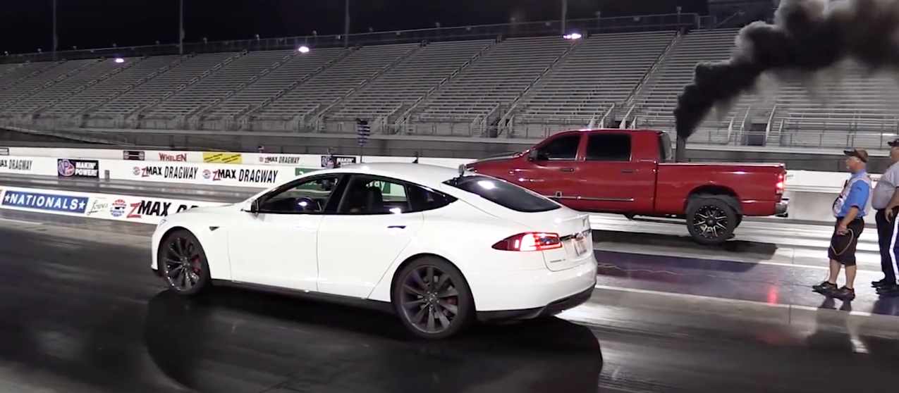 Tesla model 3 performance drag race with truck smoke black