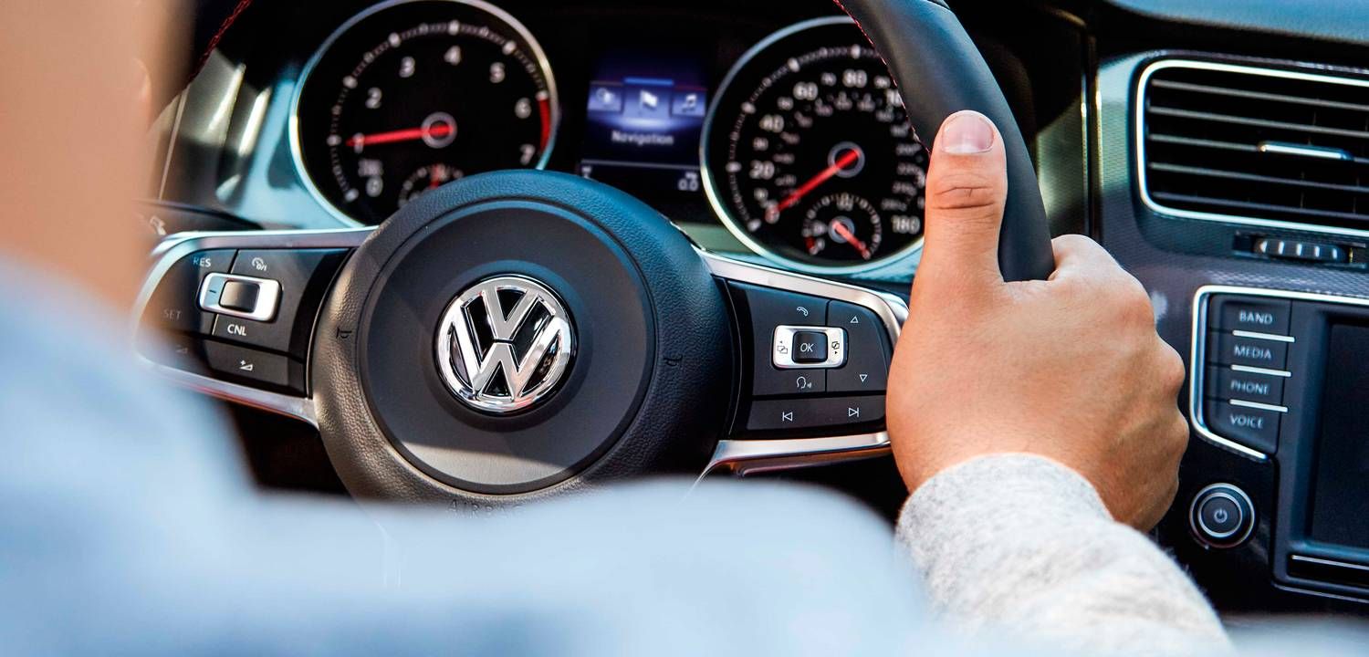 Man Holding VW Atlas' Steering Wheel