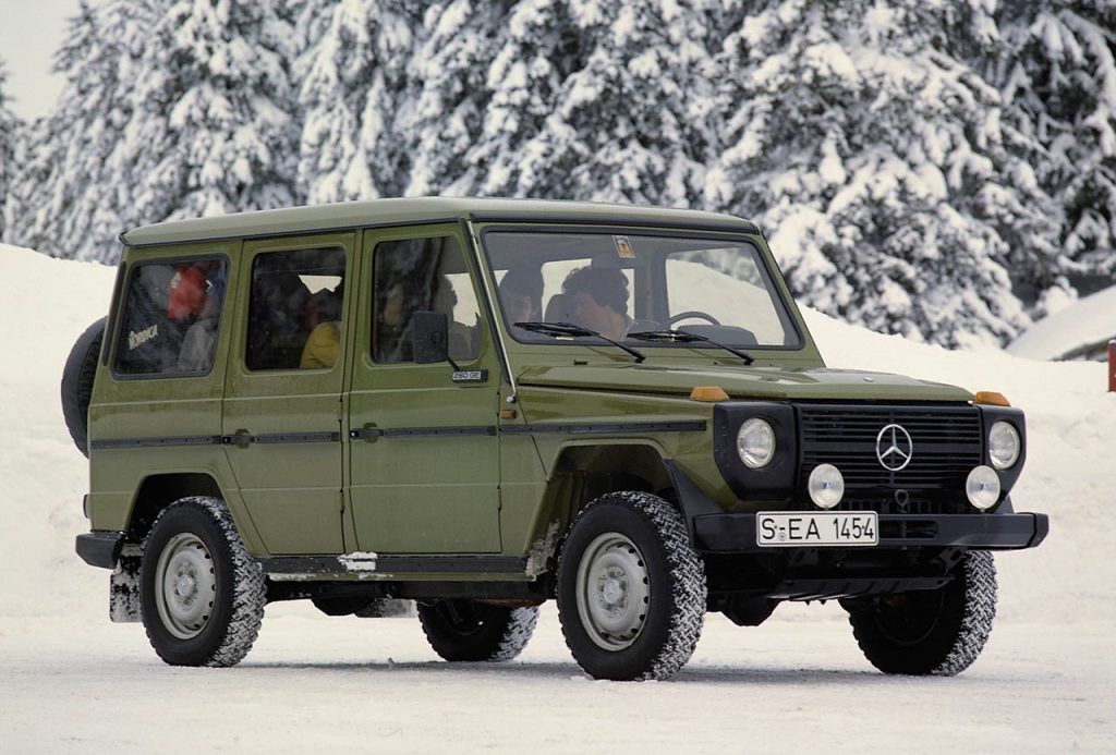 A Green 1979 Mercedes G-Wagon In The Snow