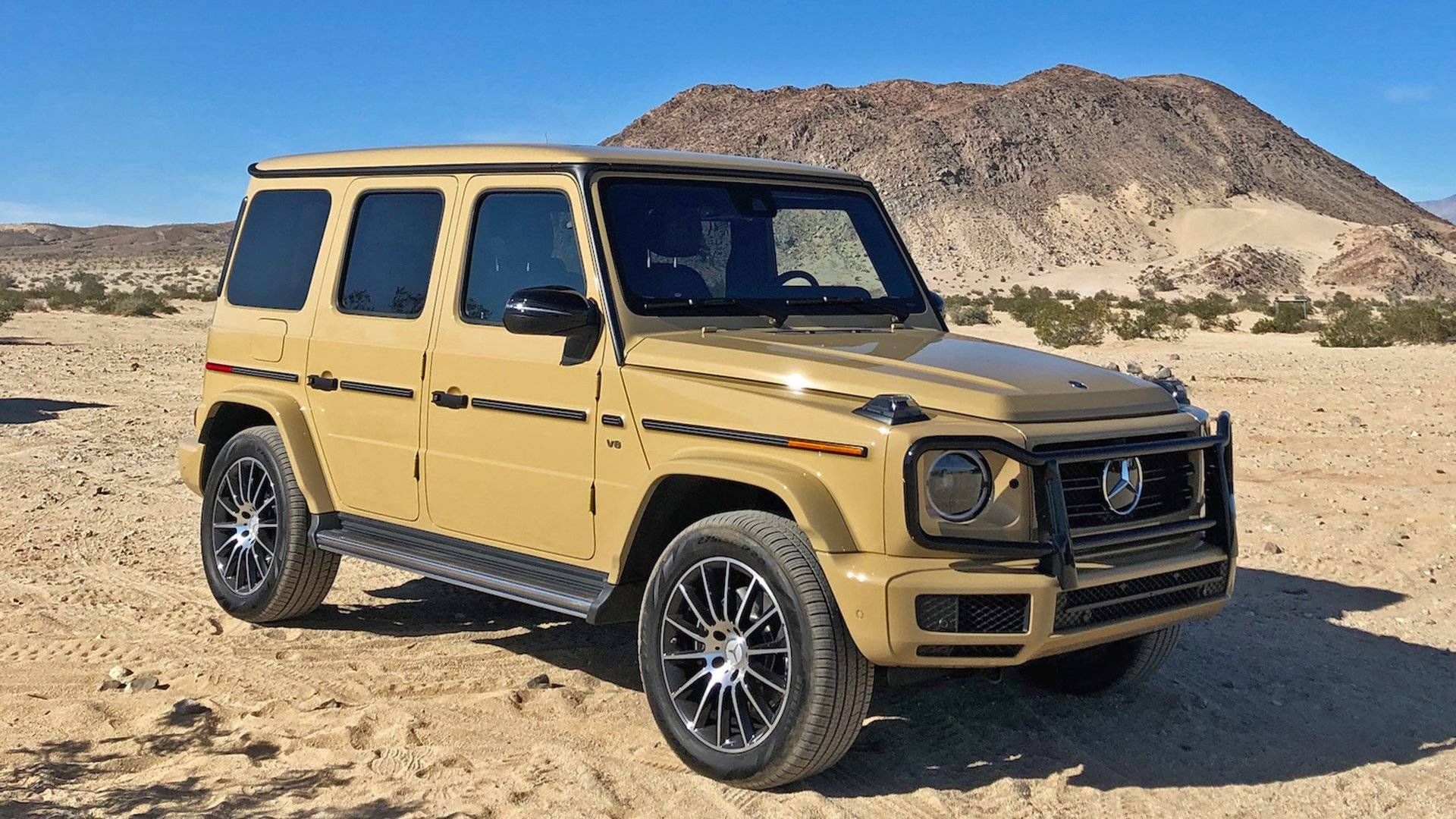 An Ochre Yellow Mercedes G-Wagon In The Desert
