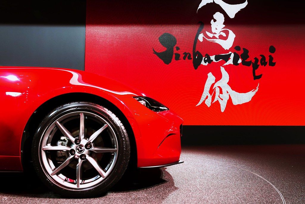 A Red Mazda MX-5 In A Showroom