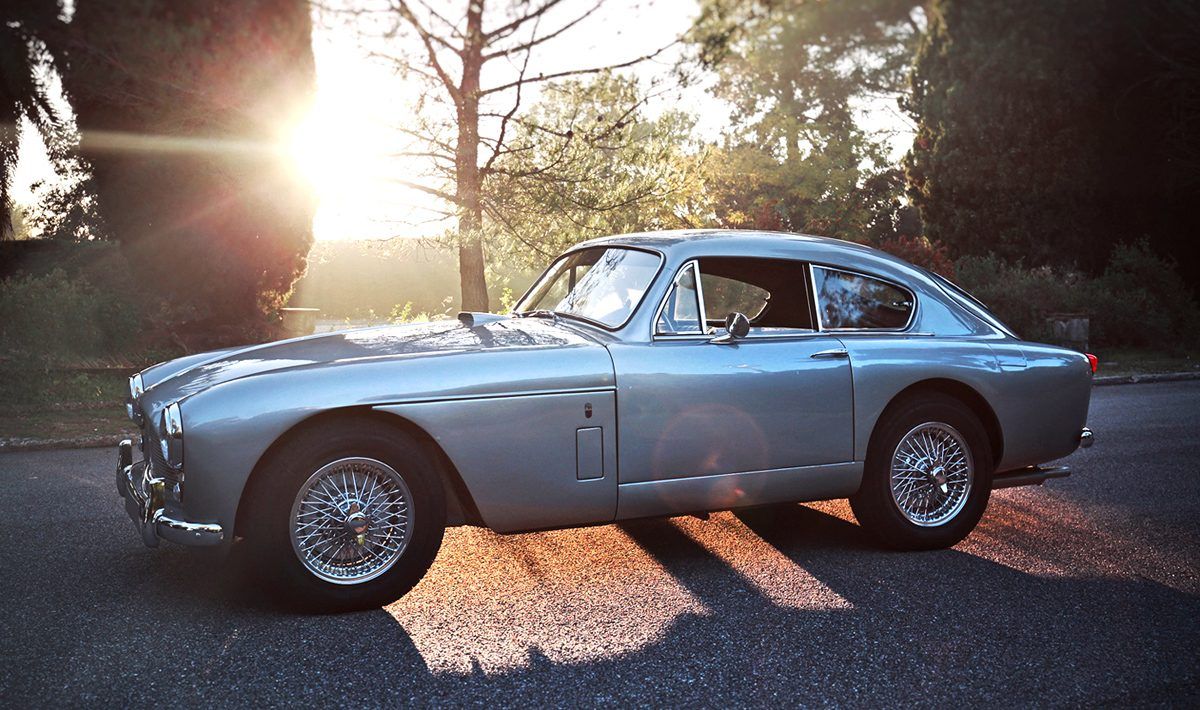 The side view of a silver Aston Martin DB Mark 3.