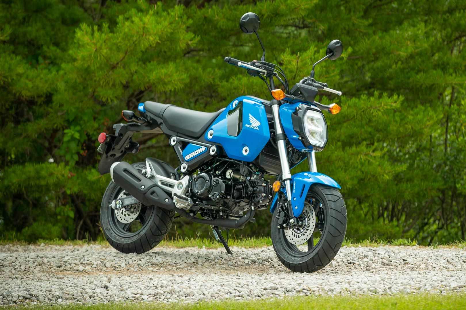 The Side View Of A Blue 2022 Honda Grom