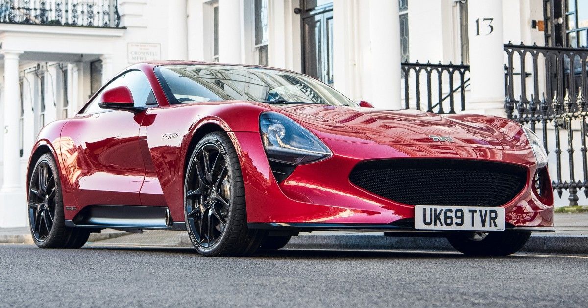 An Image Of A Red 2022 TVR Griffith On The Street