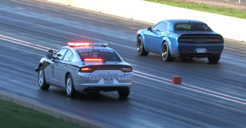 State Trooper Charger Drag Races Two Challenger Hellcats At Colorado