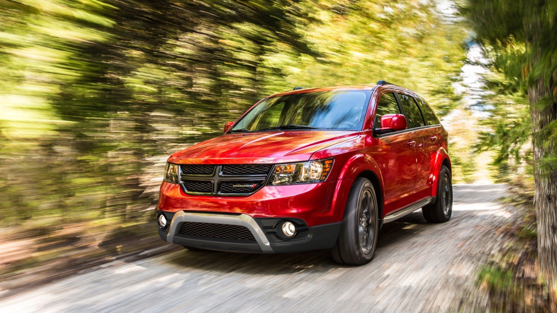 Red Dodge Journey on the road