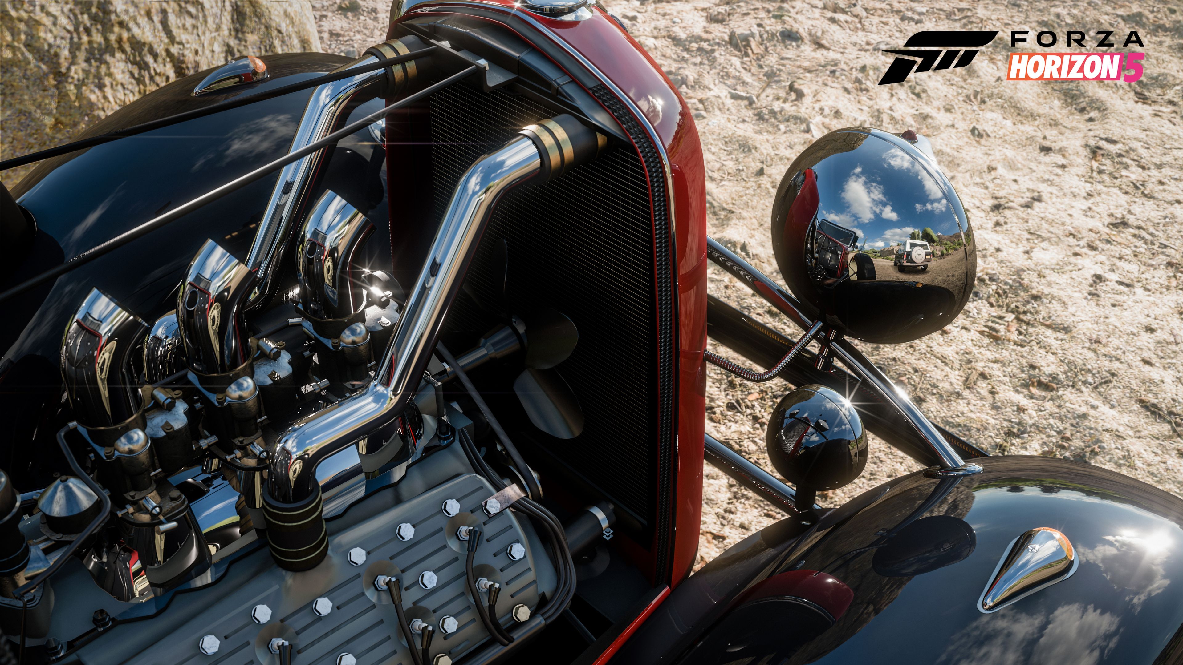 The engine bay details of a classic car in Forza Horizon 5