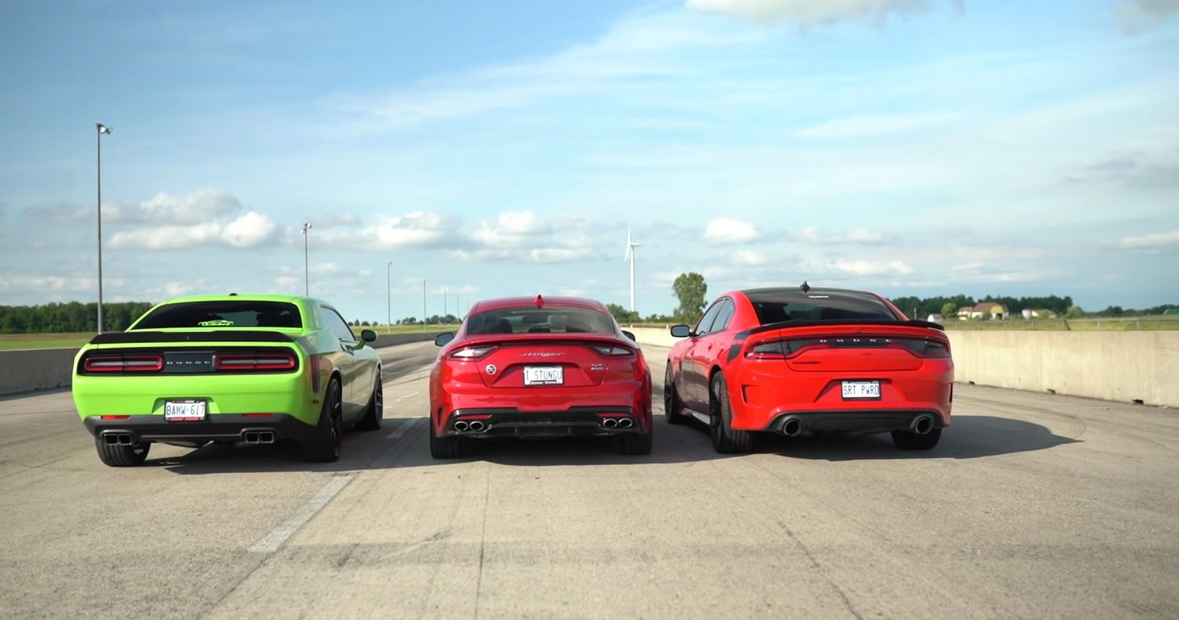 Watch The Kia Stinger GT Drag Race A Charger 392 And Challenger Scat Pack