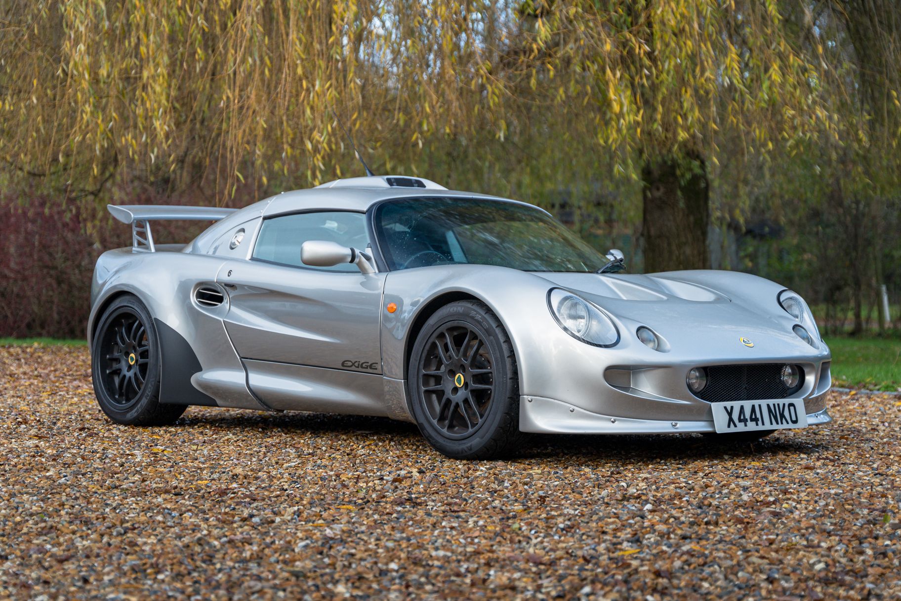 Silver Lotus Exige S1 sports car parked