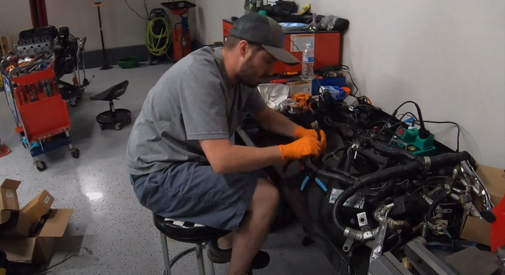 Mechanic struggles with wiring on a C6 Corvette Z06