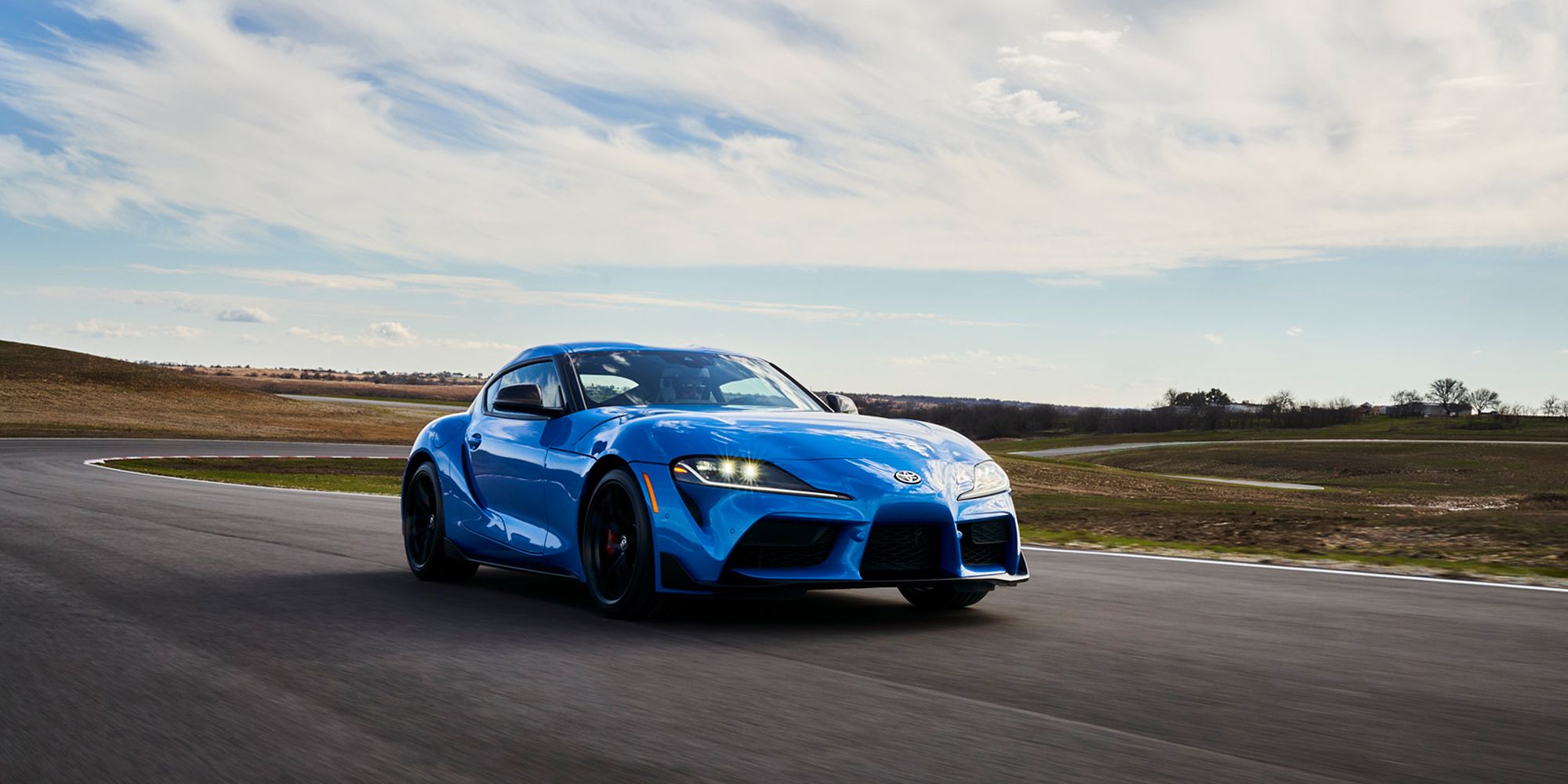 The front of a blue 2021 GR Supra