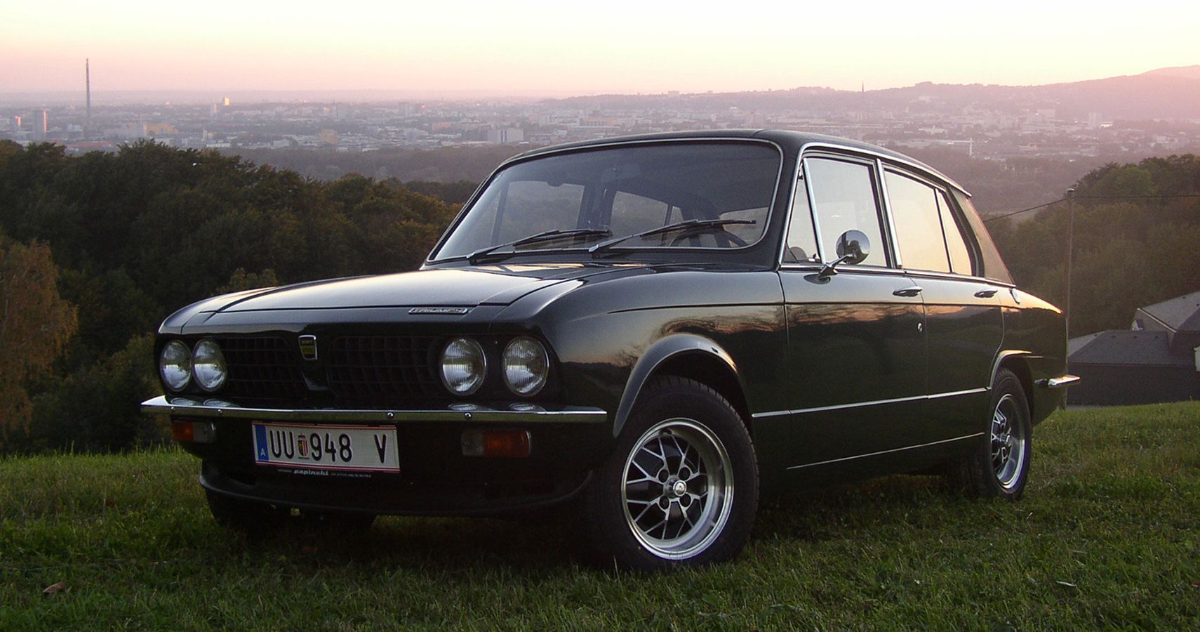 Triumph Dolomite Sprint on a hill at sunset