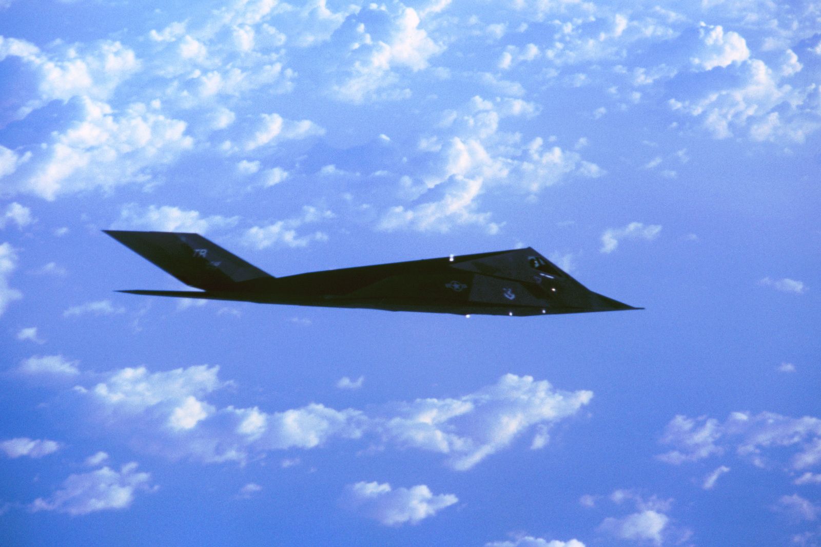air-to-air-side-view-of-a-f-117-nighthawk-stealth-fighter-during-a-training-889f76-1600