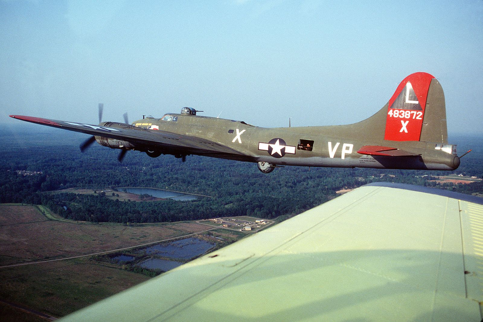an-air-to-air-left-side-view-of-the-restored-world-war-ii-b-17g-flying-fortress-3567ff-1600