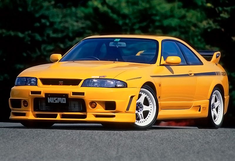 Yellow 1998 Nissan Skyline GT-R Nismo 400R R33 Parked Outside