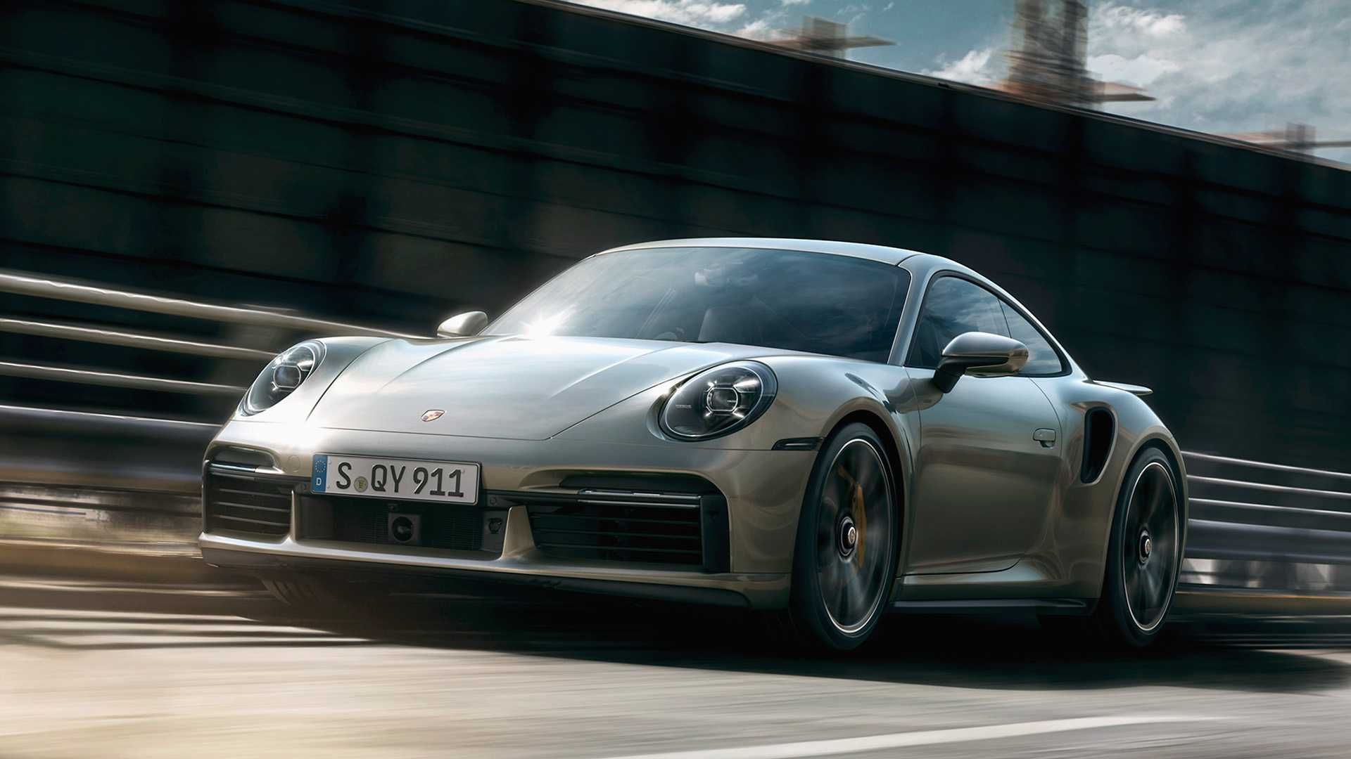 2021 Porsche 911 Turbo S, silver greay, front, driving on the motorway, Porsche