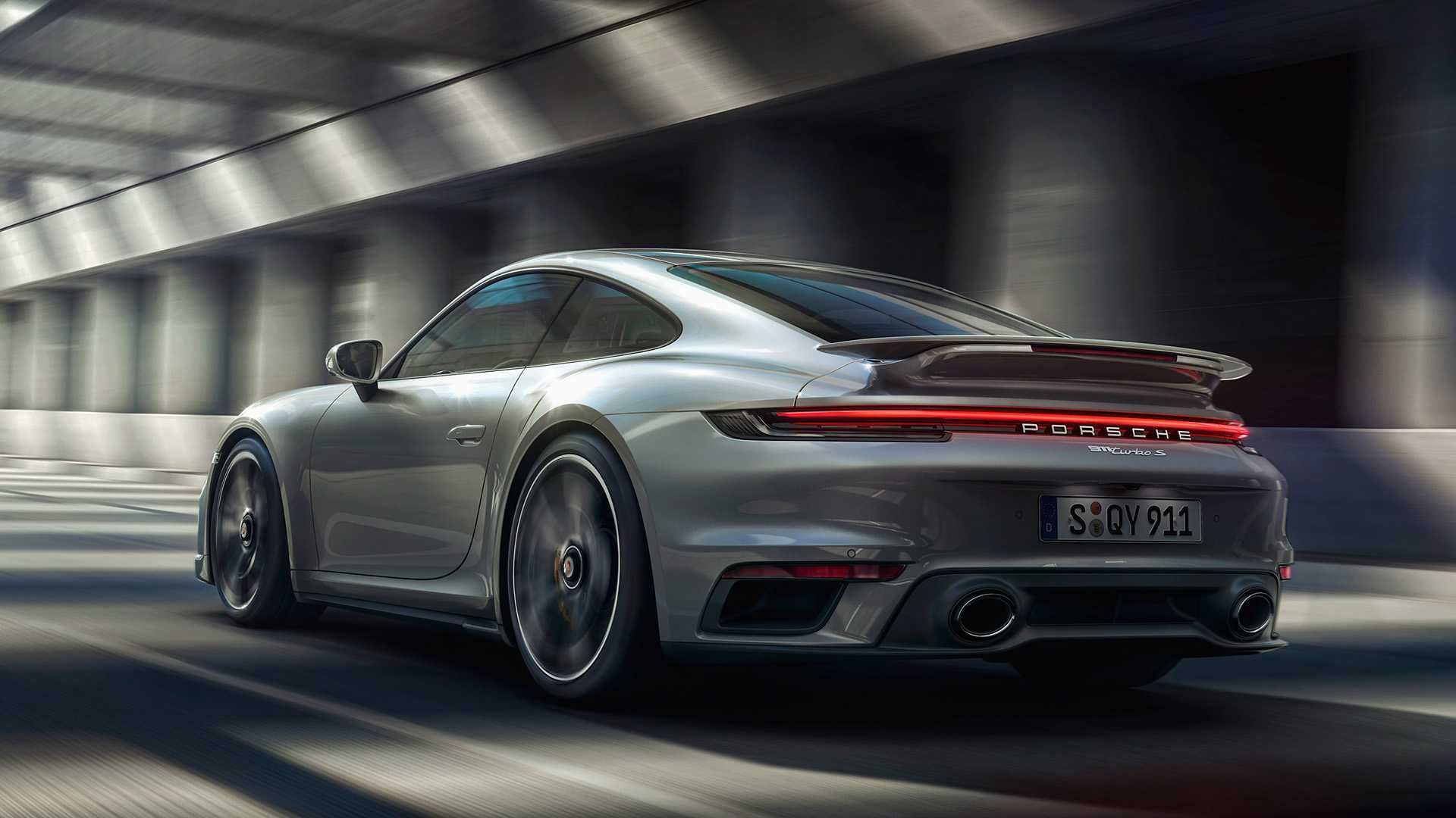 2021 Porsche 911 Turbo S, silver greay, front, driving on the motorway, rear, Porsche