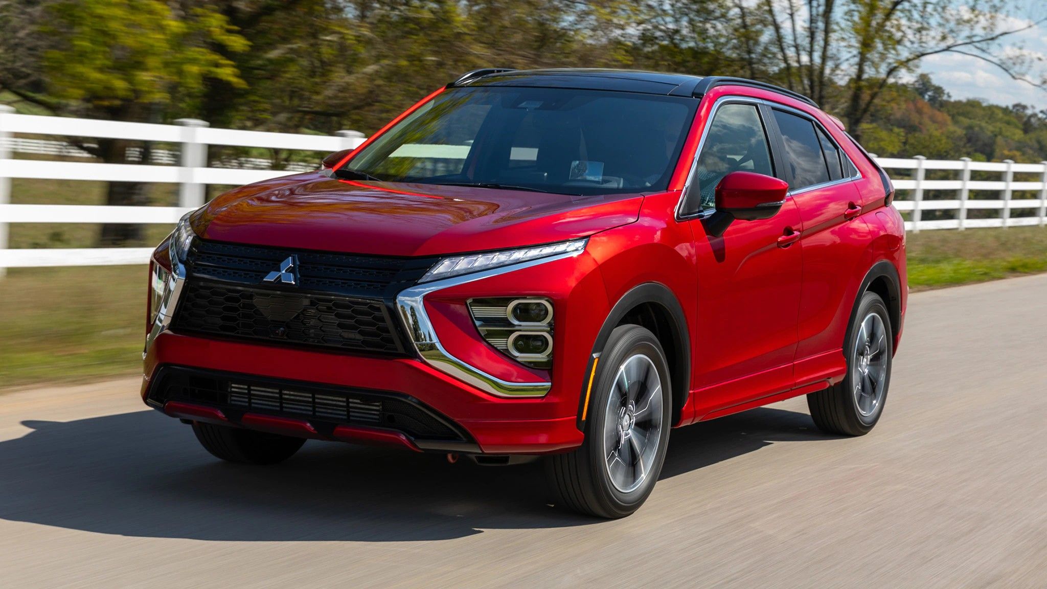A Red Mitsubishi Eclipse Cross On The Road