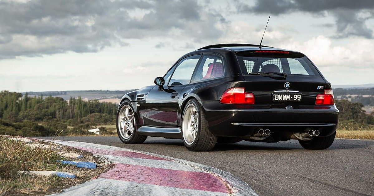 BMW Z3 M Coupe in black from the back, parked along a curve