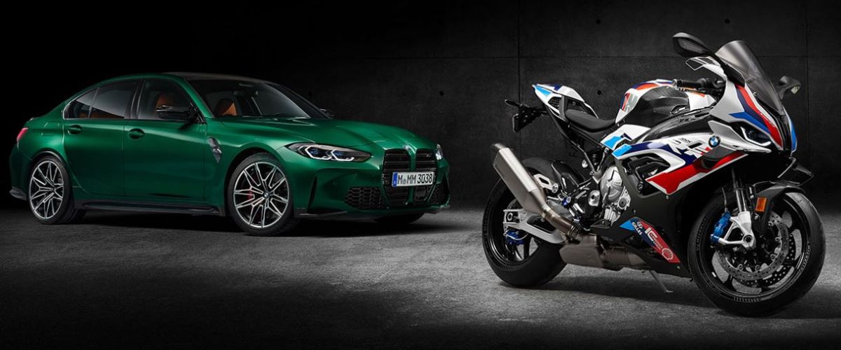 A BMW M3 and a M RR in a studio.