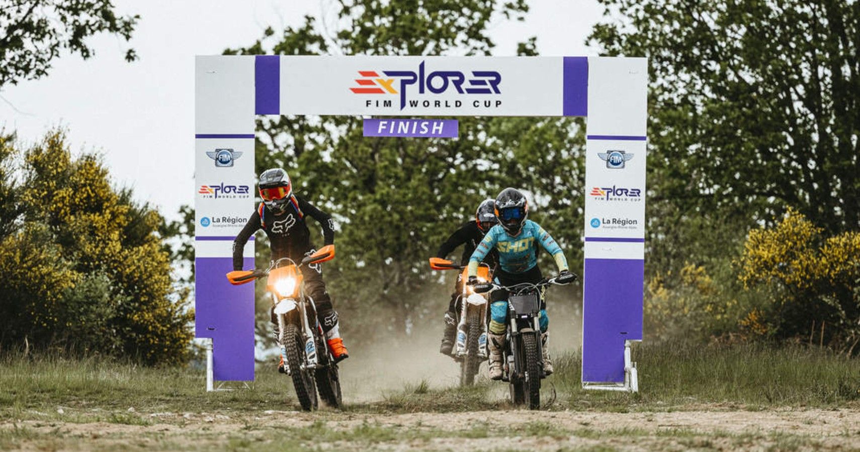 Competitors racing in a demo of the 2022 FIM E-Xplorer series.