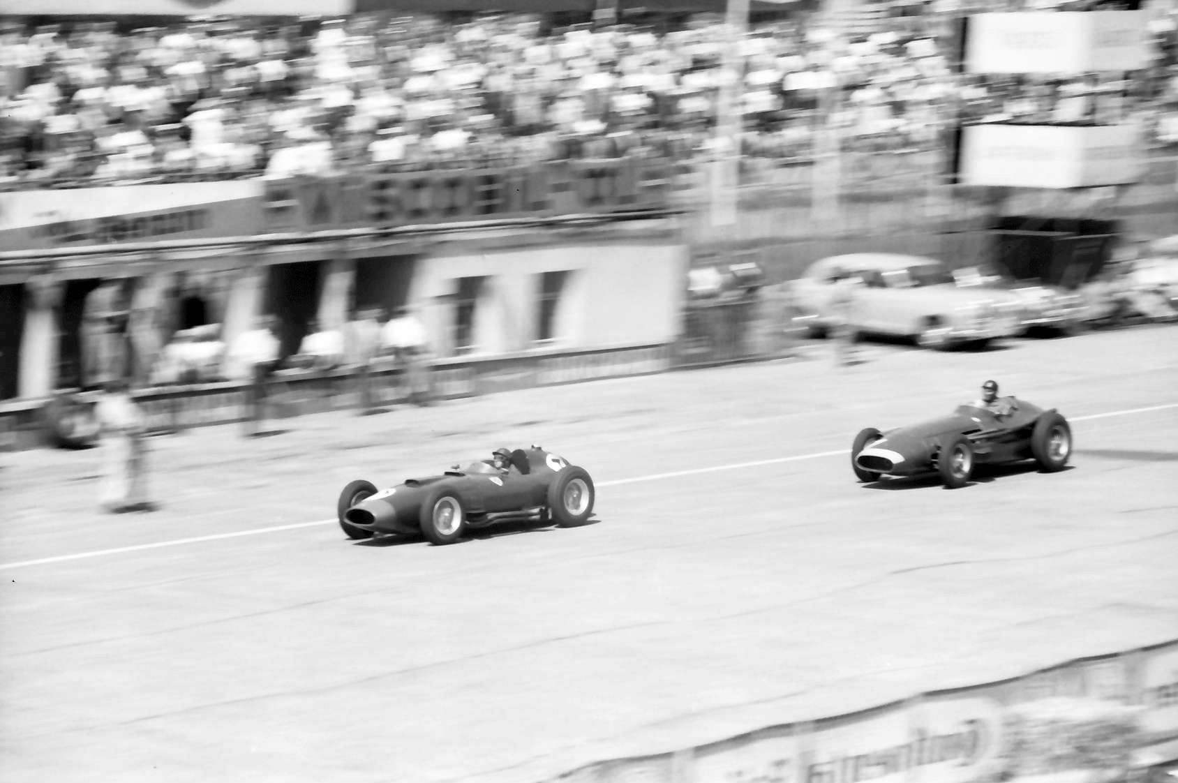 Fangio_chases_Collins_Nurburgring_1957 Philly wragher wikimedia commons