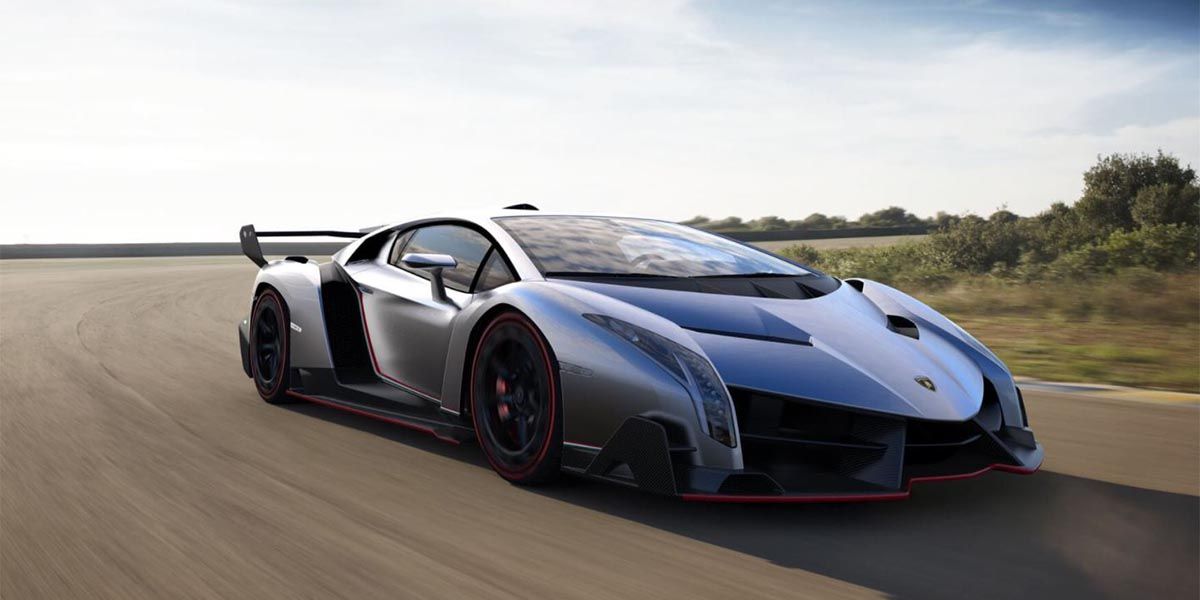 Grey Lamborghini Veneno sports car driving