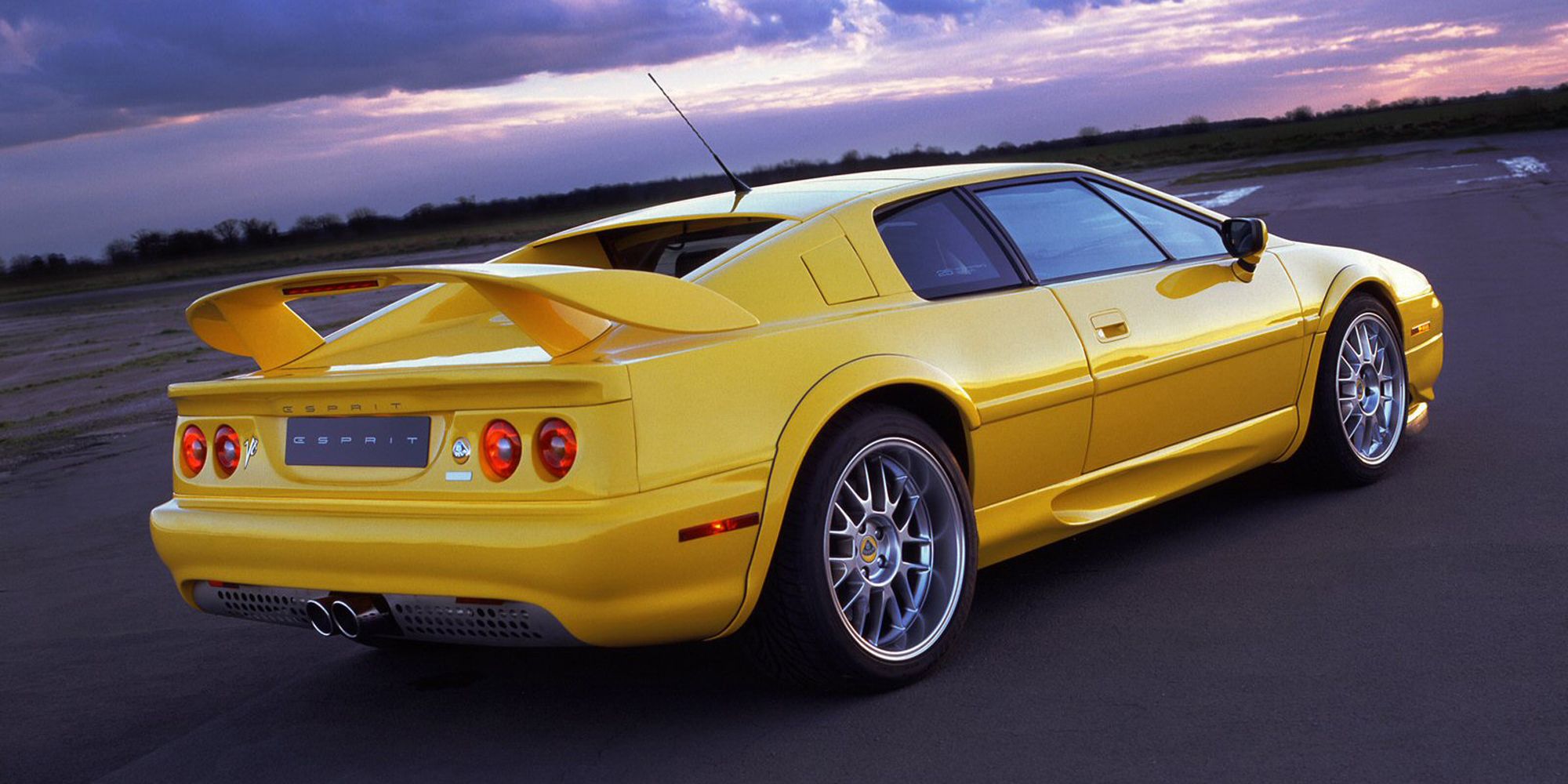 Rear 3/4 view of the Esprit V8, yellow