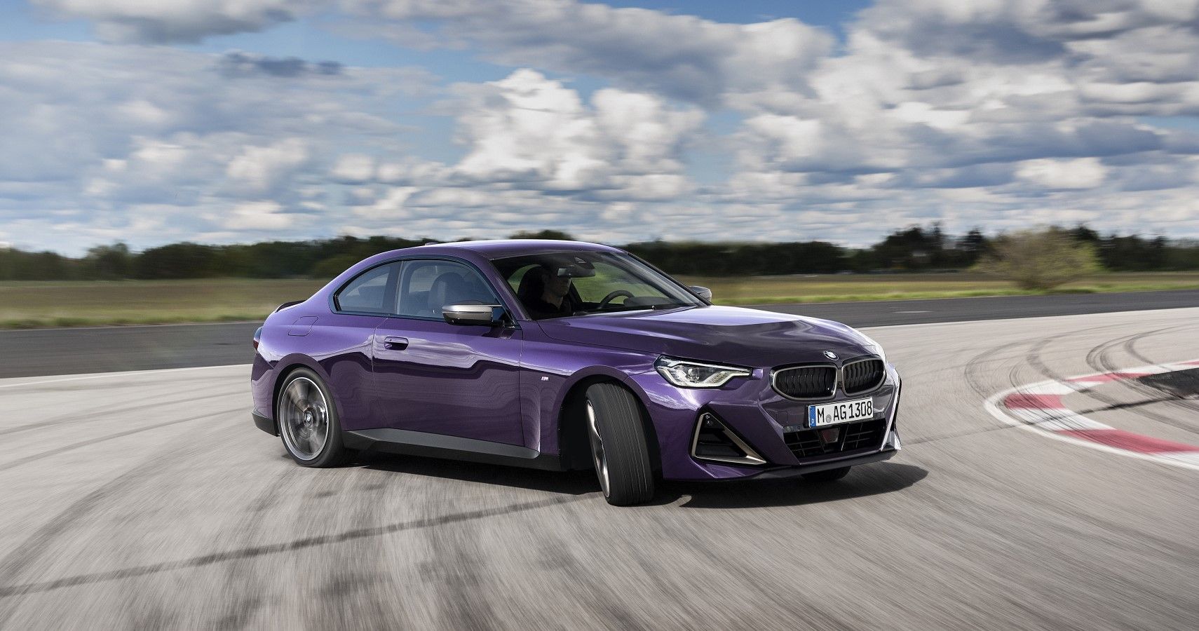 Purple 2023 BMW 2-Series M240i on track