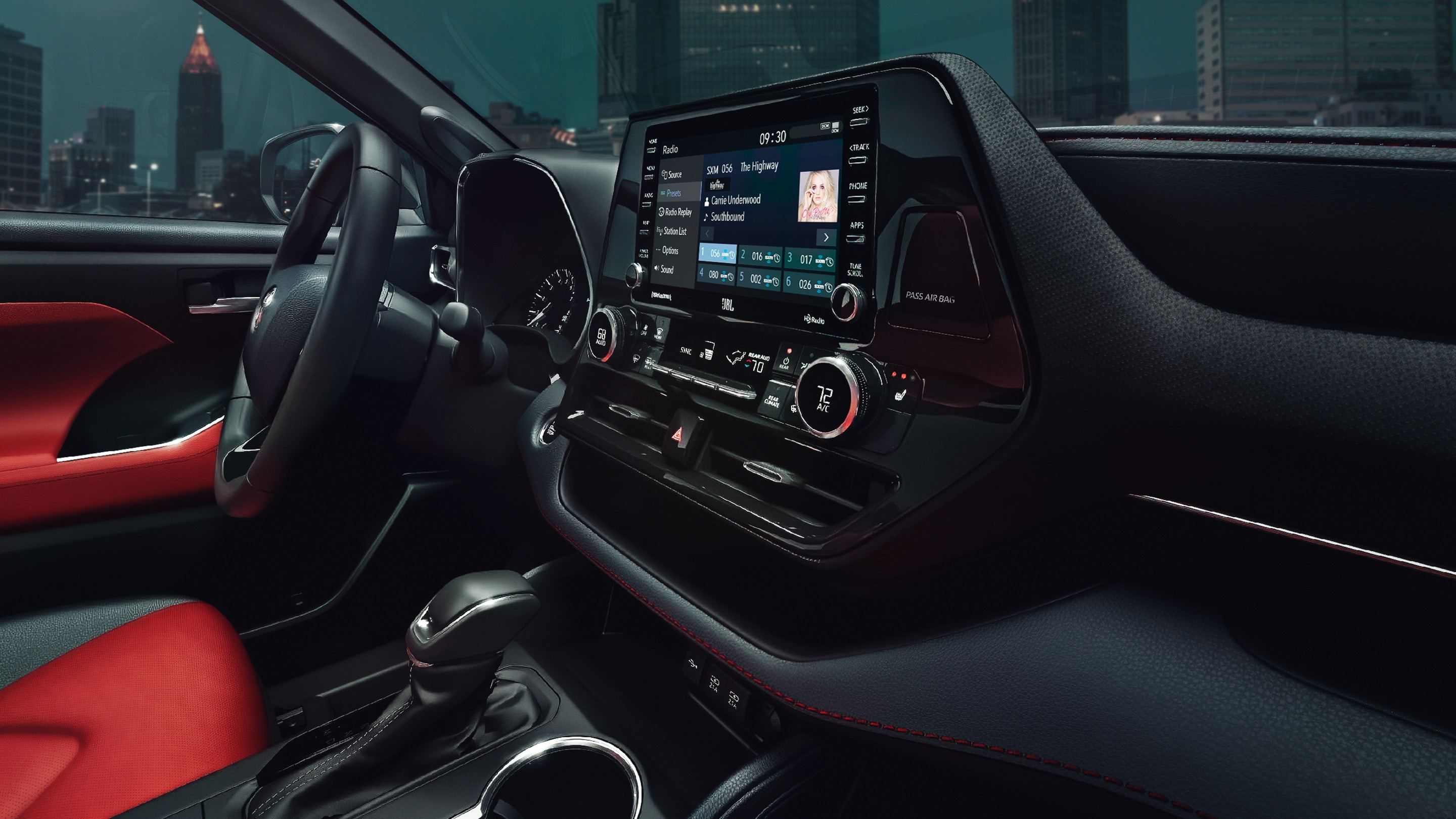 2021 Toyota Highlander XSE interior shown in Cockpit Red leather