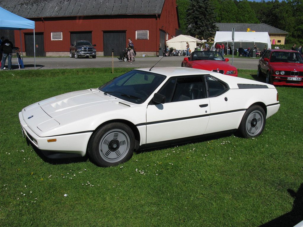 A plain white BMW M1 can be mistaken for a 90's era Corvette or Nissan