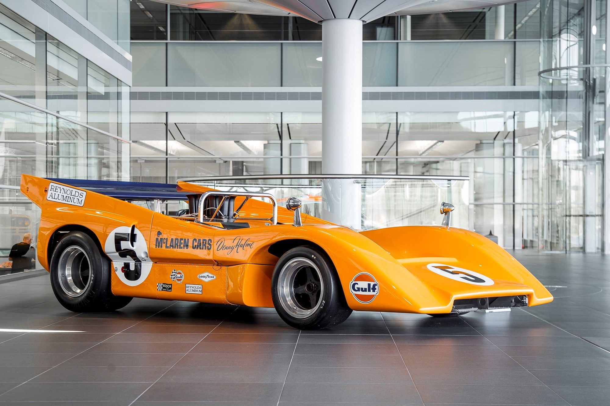 An Image Of A Yellow McLaren Race Car