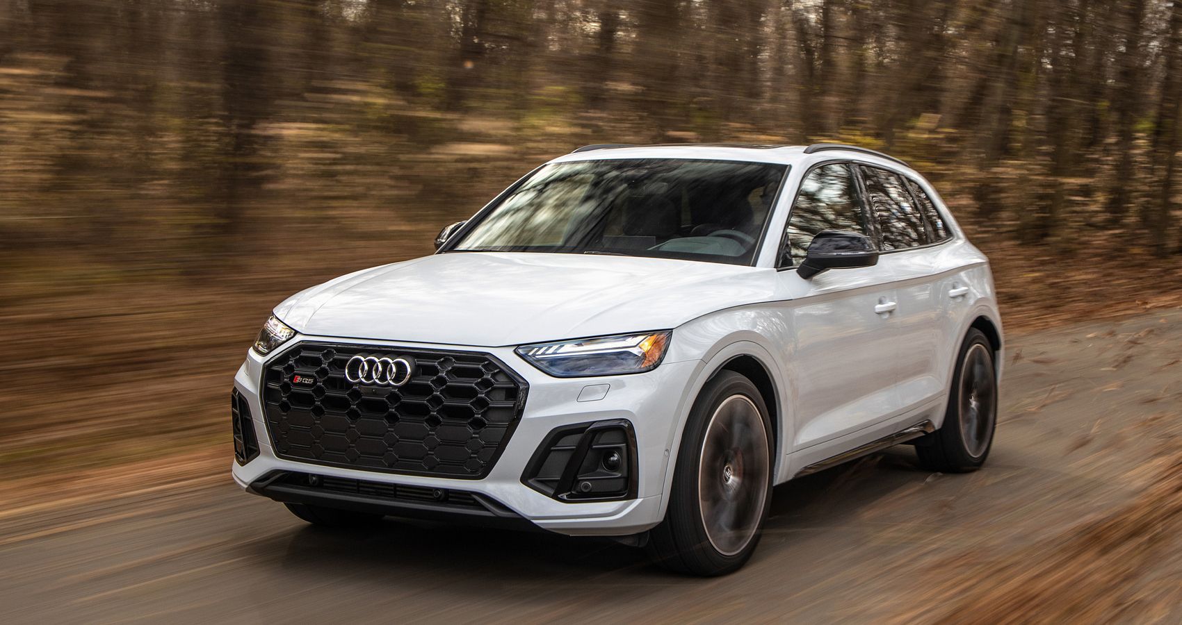 A white Audi SQ5 on the move