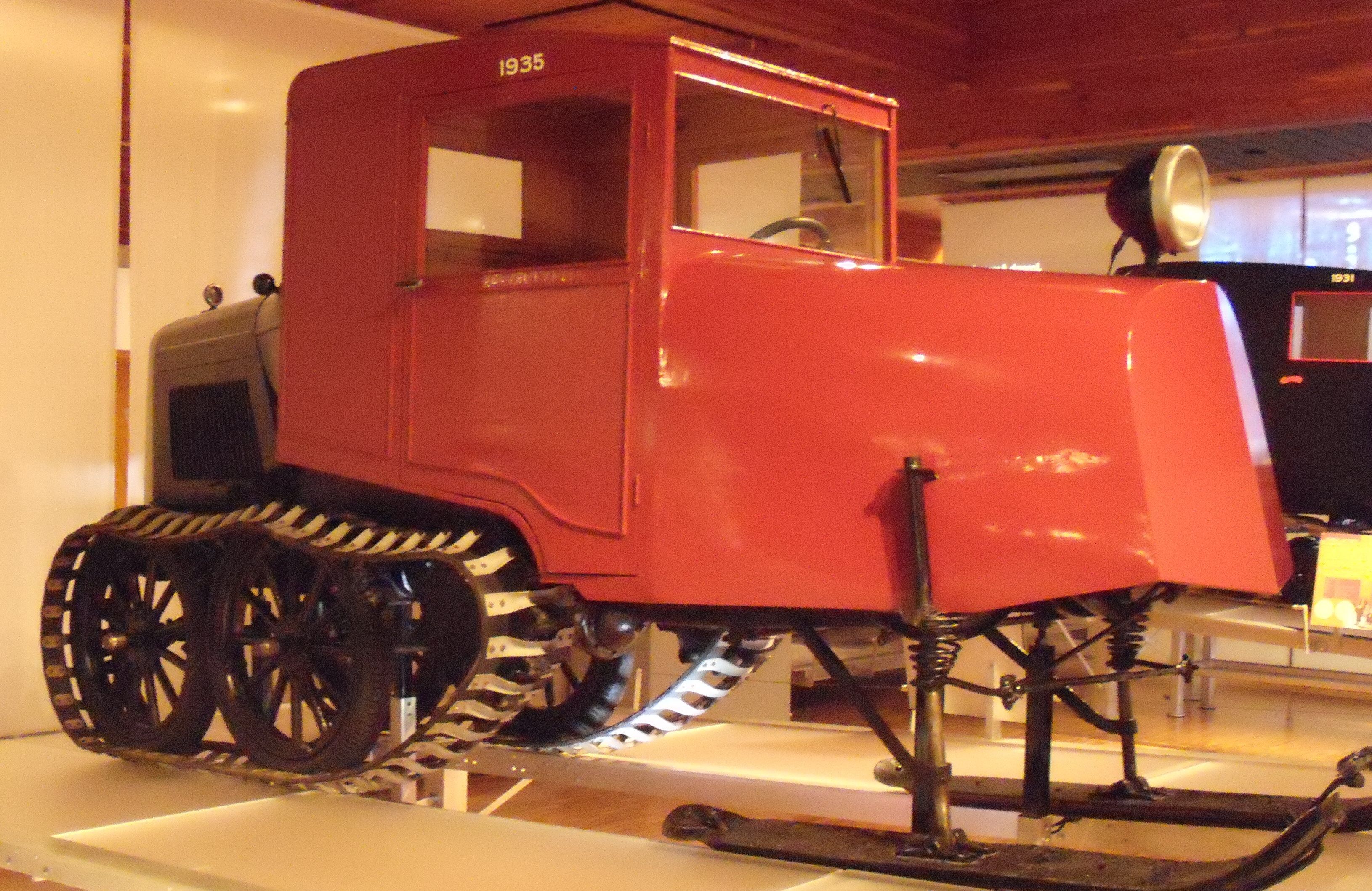 Red Bombardier Snow Vehicle