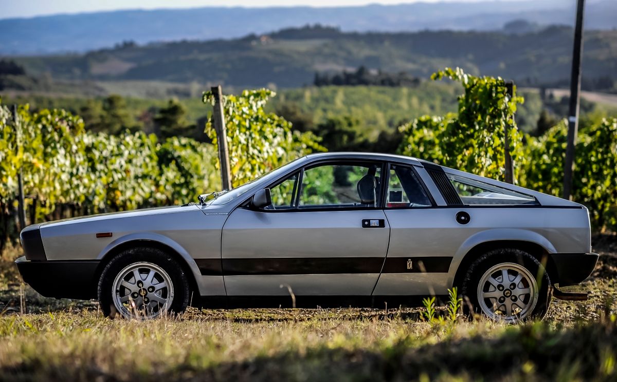 1980 Lancia Montecarlo In Gray Side Profile In Vineyard