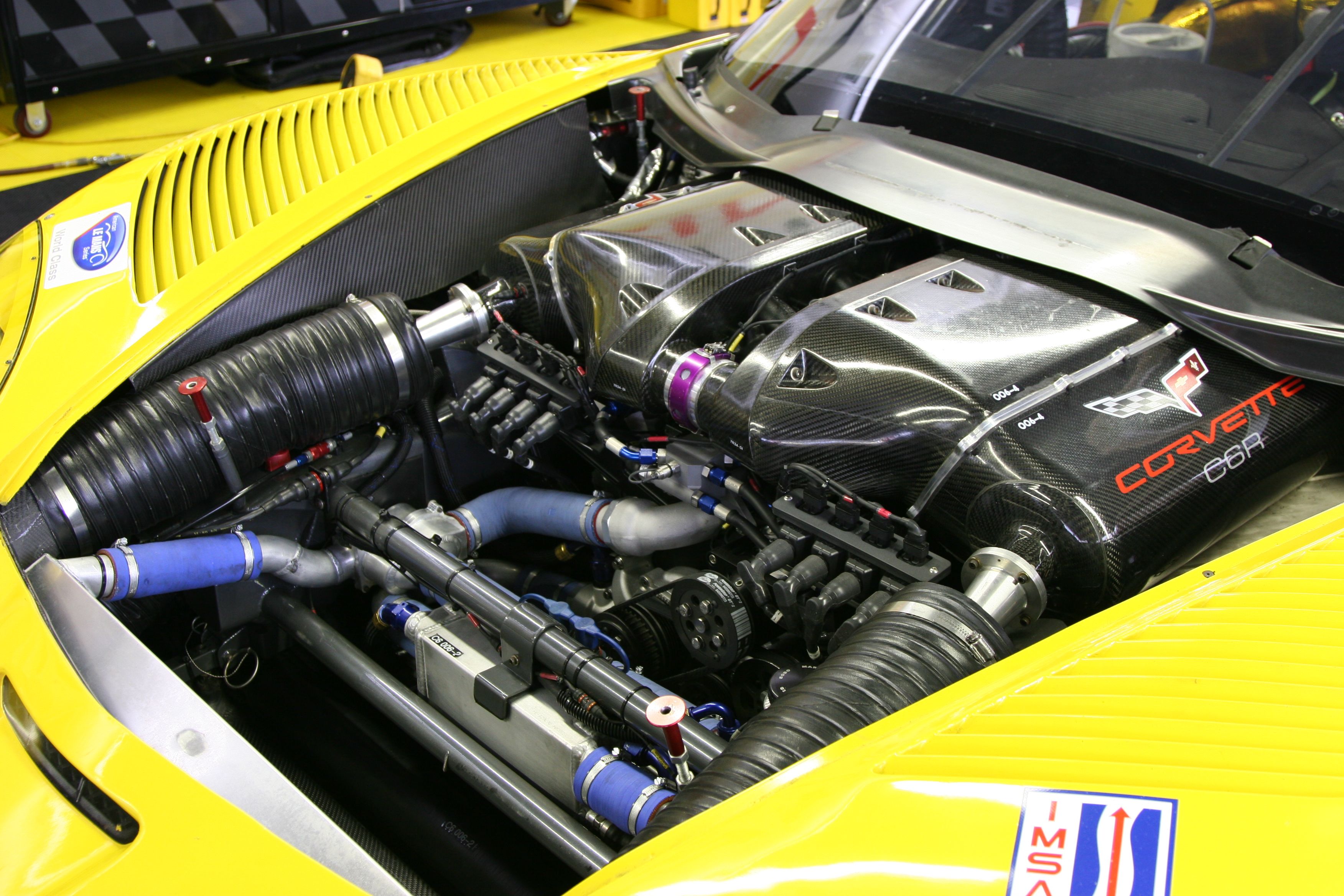 Chevrolet Corvette C6.R LS7.R Engine Close-up Above view via GM Authority