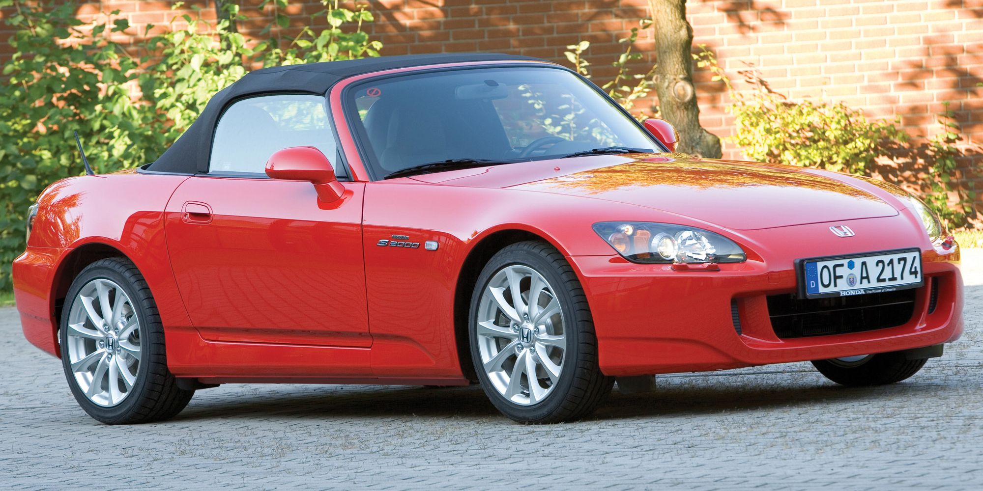 Front 3/4 view of the AP2 S2000 in red