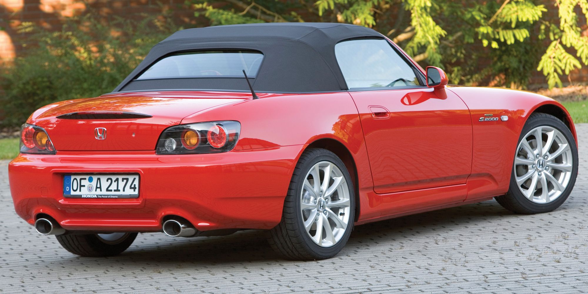 Rear 3/4 view of a red AP2 S2000