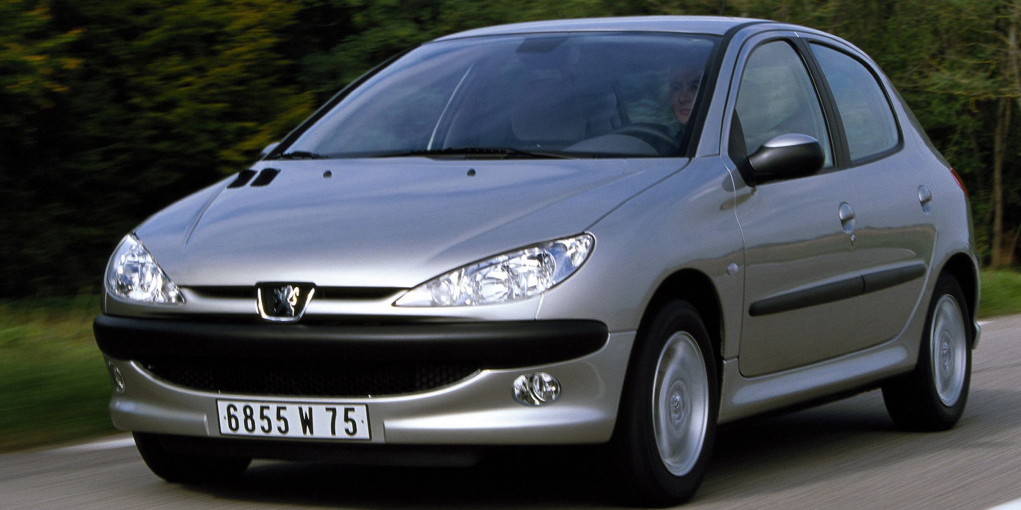 The front of a Peugeot 206 on the move