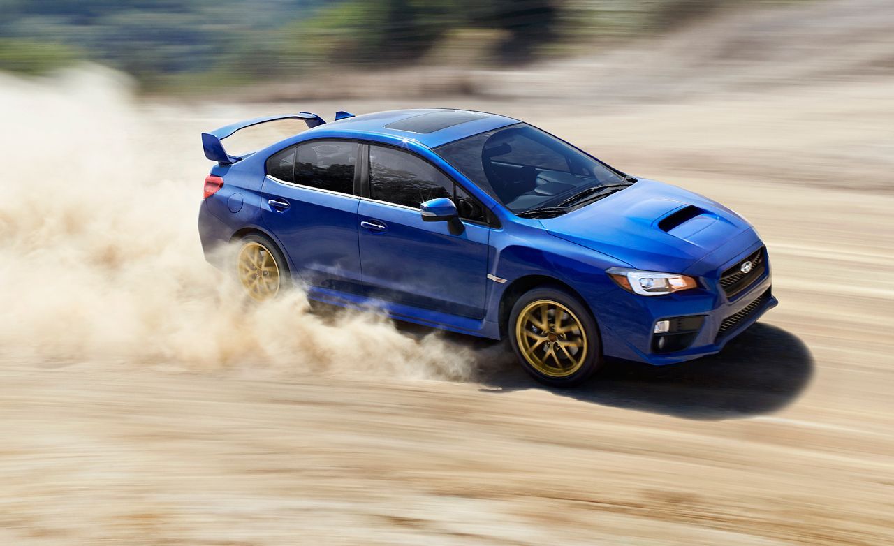 Rally WRX STI Blue with Bronze Gold Rims in the Dirt