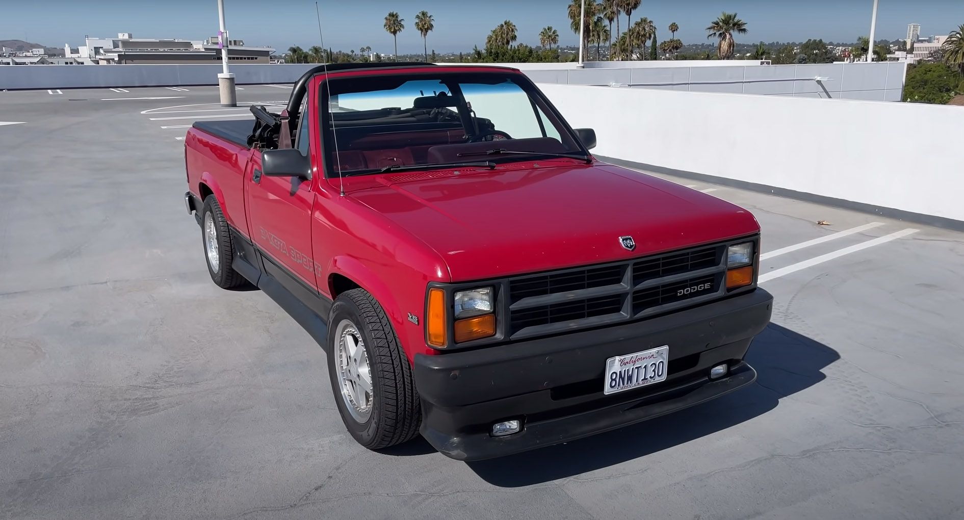 Red 1989 Dodge Dakota Sport Convertible in parking lot