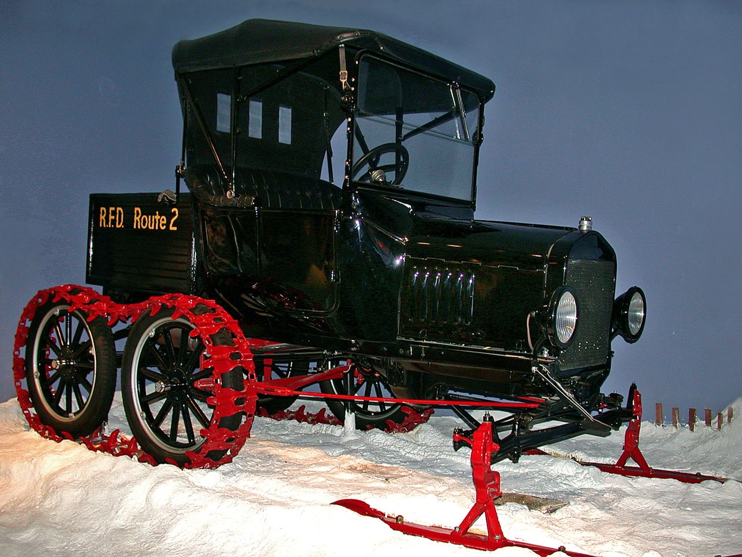 Black Model T Snowmobile With Red Tracks