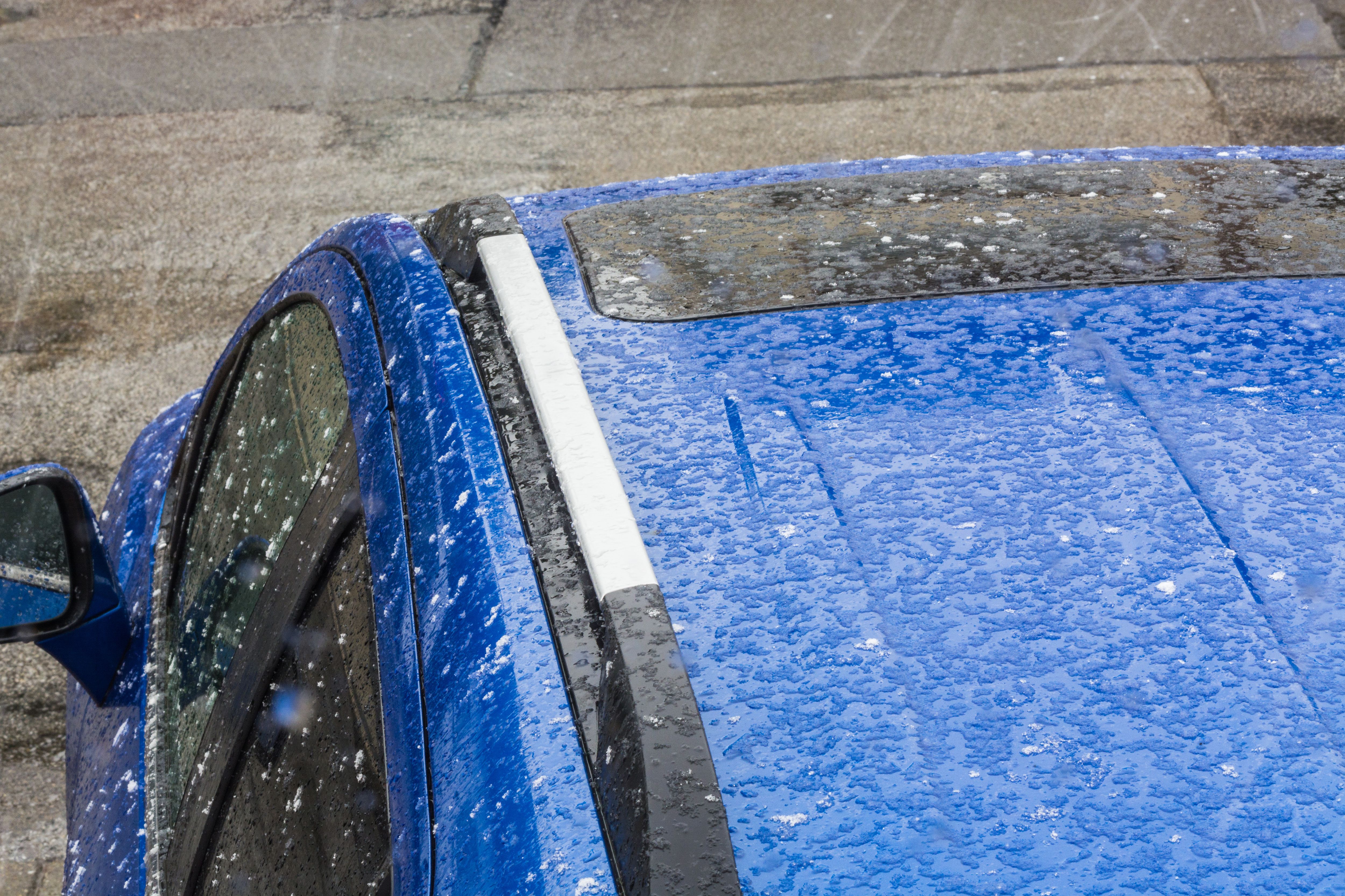 Blue Car In Hailstorm