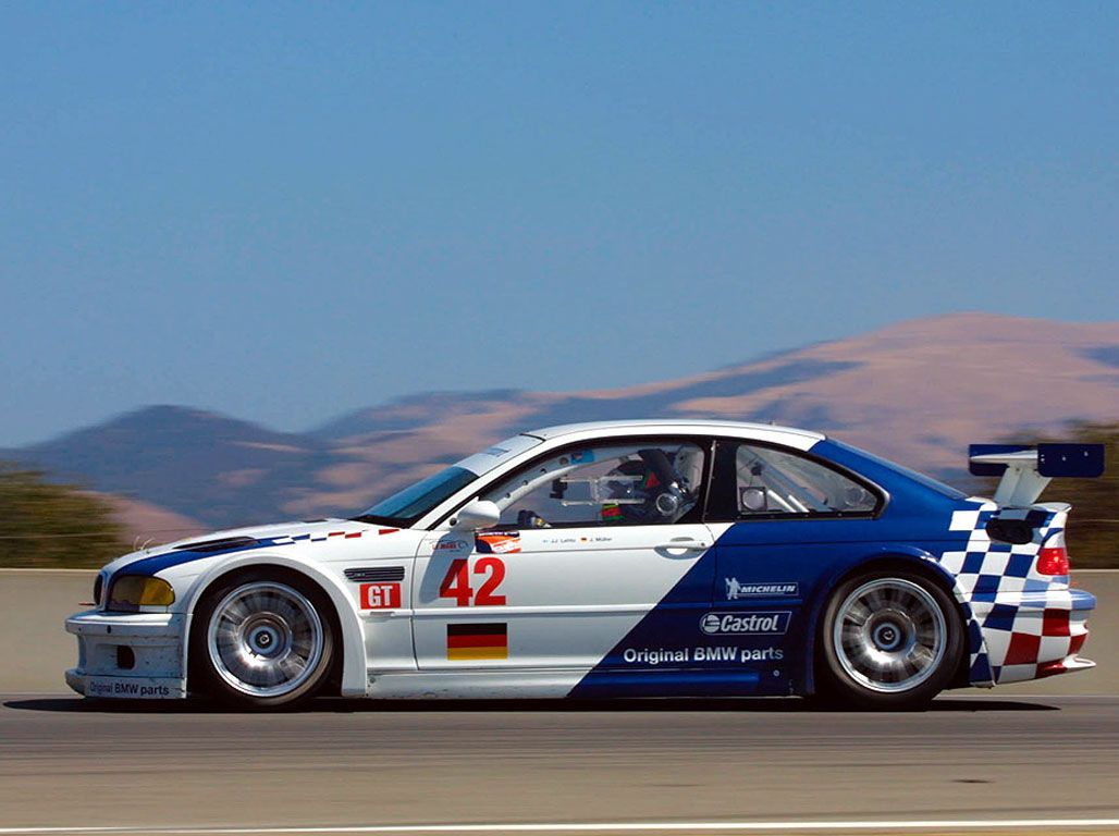 White and blue 2001 M3 GTR, driver's side view