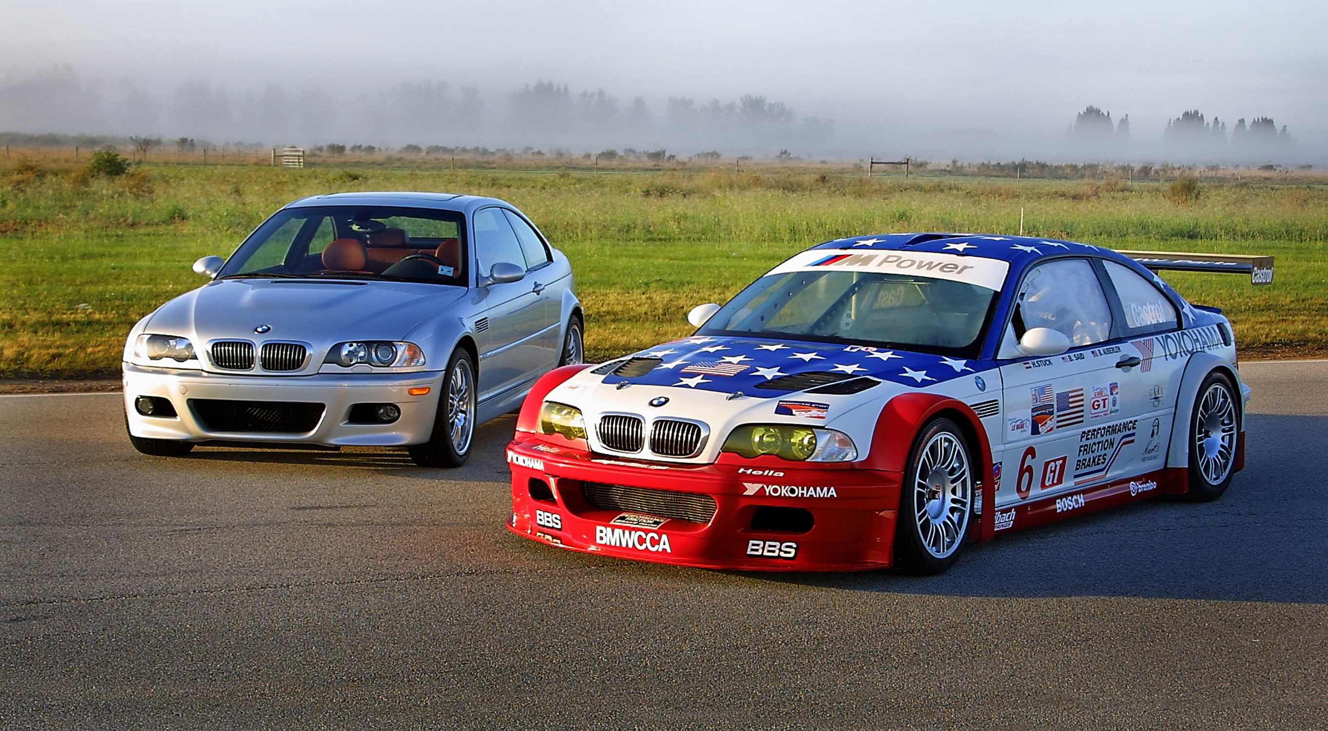 Two 2001 M3 GTR models, one decorated and one not