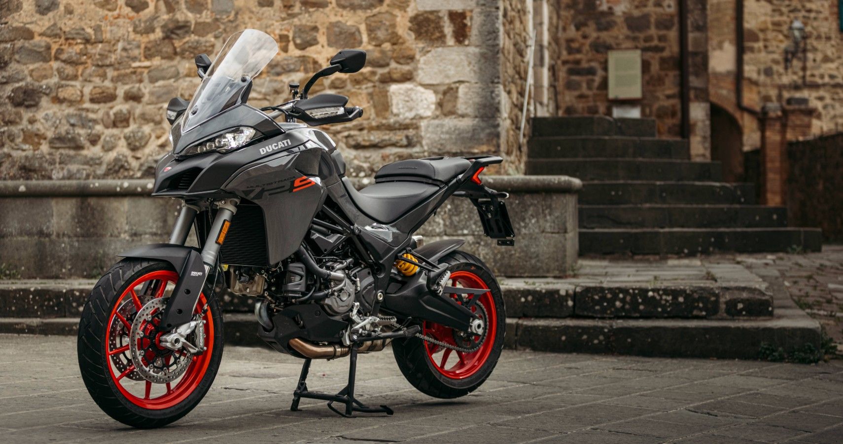 A 2022 Ducati Multistrada V2S parked on its centerstand.