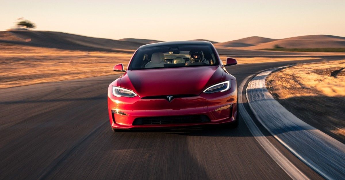 A Red Tesla Model S Plaid In Motion